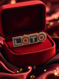 Pin's publicitaire Loto vintage années 80 badge rétro jeu ancien FR