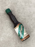 Miniature alcool Underberg partiellement remplie, flacon apéritif décor vert
