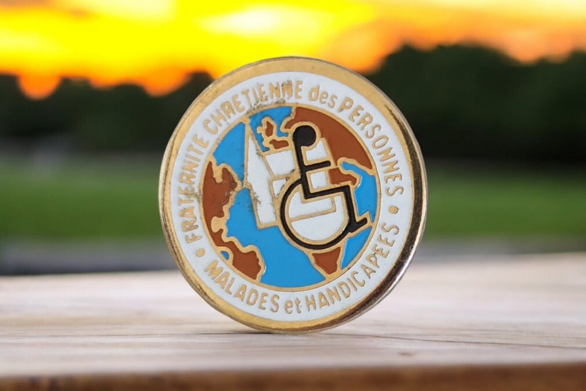 Vintage Brotherhood of Christian Handicapped round multicolored enamel pin symbol