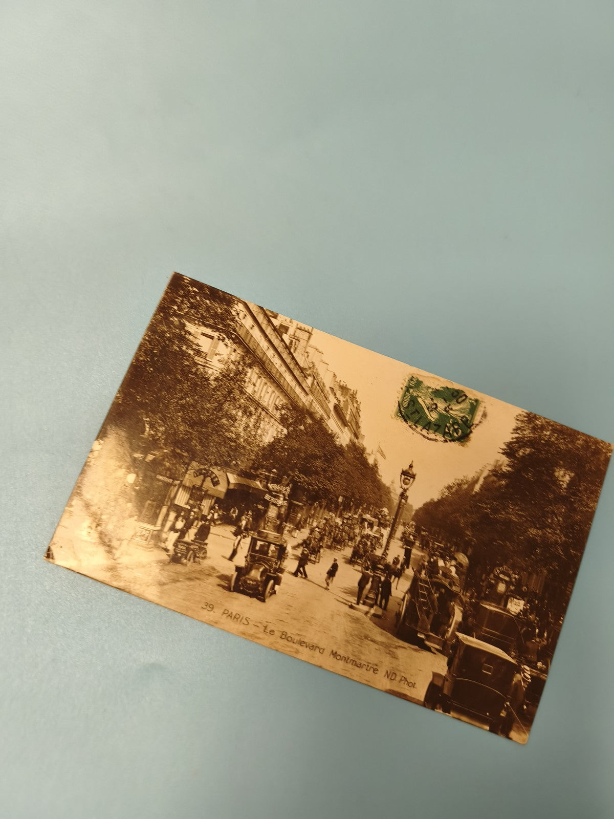 Ancienne carte postale animée Paris Boulevard Montmartre vintage, timbre visible