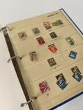 Classeur de timbres partiellement rempli, pages thématiques Japon, reliure bleue