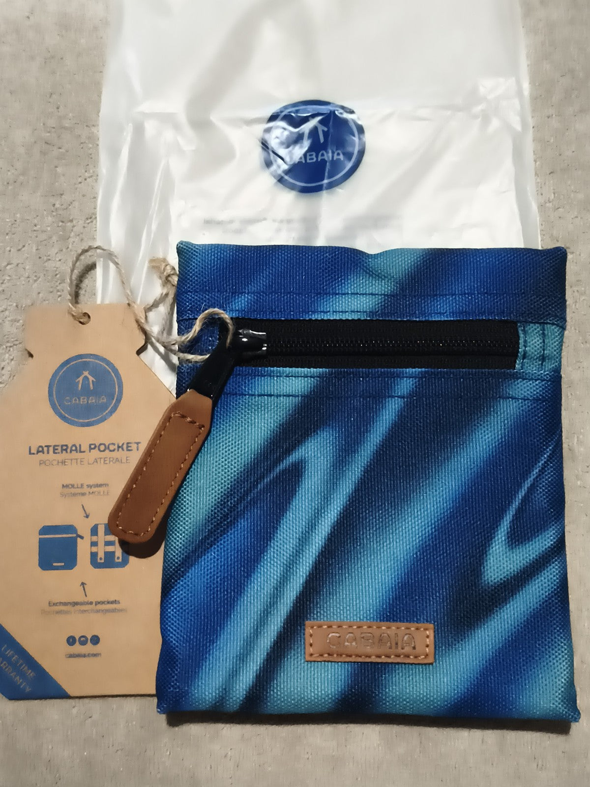 Pochette latérale Cabaia bleu motif vague 15 cm neuve, accessoire sac