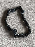 Bracelet pierres naturelles noir éclats irréguliers élastique, perles fantaisie