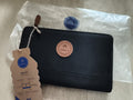 Portefeuille Cabaia noir badge rond, neuf, 21 cm, zip latéral, wallet