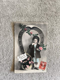 CPA ancienne enfant panier fleurs vœux Heureuse Année timbre rouge