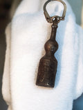 Porte-clés vintage bouteille GET 27 publicitaire ancien rétro métal foncé