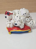 Figurine bouchon trois Dalmatiens décoratifs sur coussin, statuette chien déco