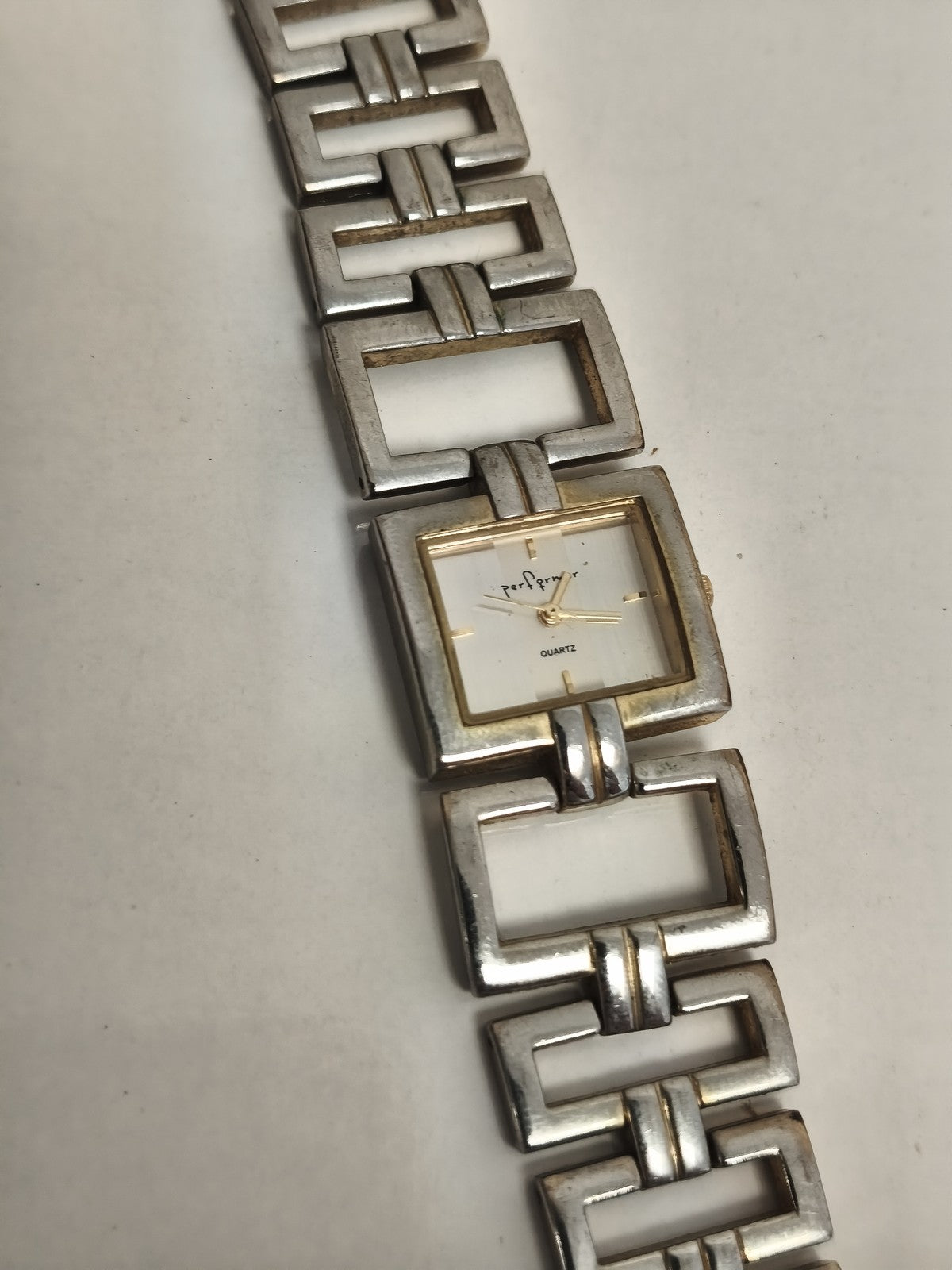 Montre vintage Perfory quartz femme, bracelet géométrique métal argenté