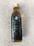 Miniature whisky John Player Special 12 ans bouteille partiellement remplie