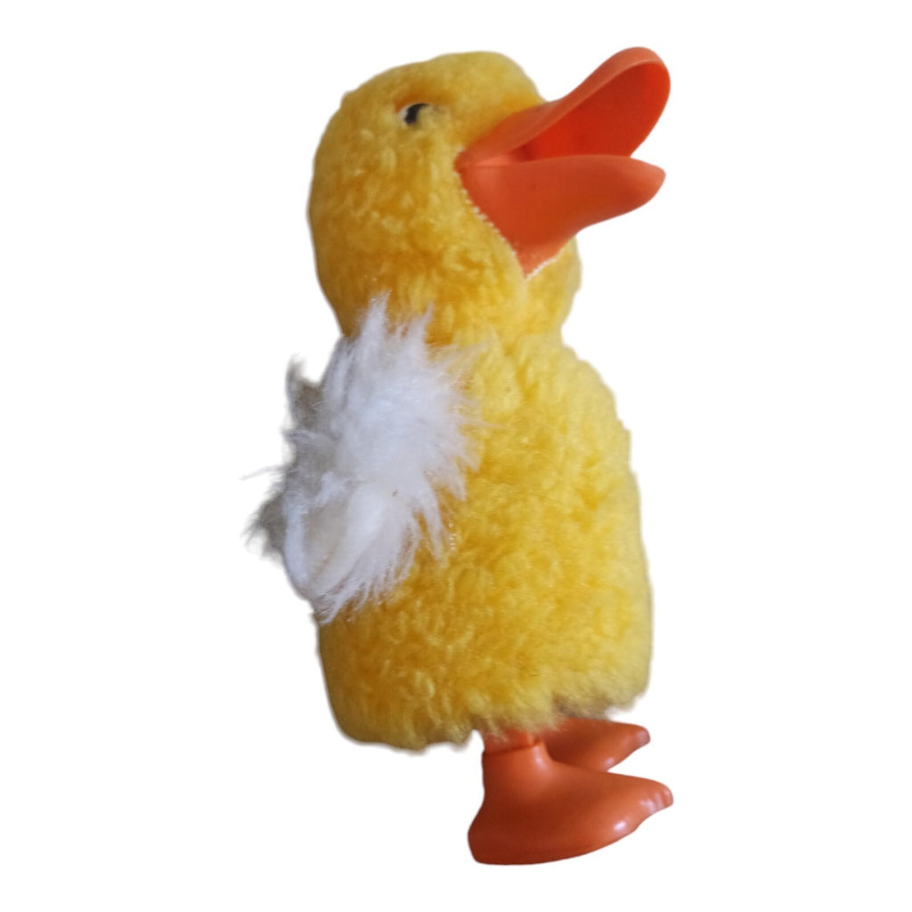 Jouet mécanique canard Max Carl 1979 vintage à clé jaune peluche ailes blanches