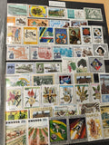 Lot timbres Rwanda thématiques colorés animaux fleurs sports occasions diverses