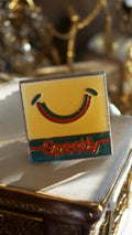 Pin's vintage Speedy années 80 émaillé jaune logo rétro publicitaire