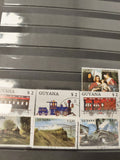 Lot timbres Guyana thème trains et locomotives, motifs colorés, oblitérés