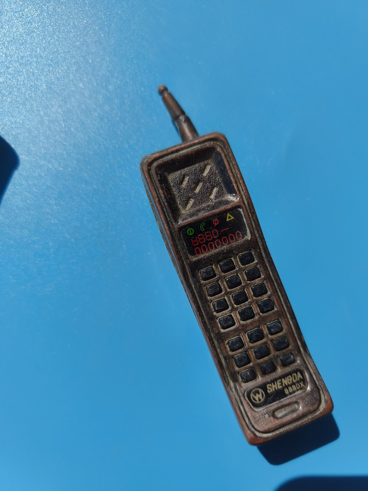 Ancien briquet publicitaire rétro forme téléphone portable SHENBOA 880X