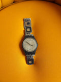 Montre Swatch homme vintage rétro, cadran clair, bracelet à maillons graphiques