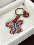 Porte-clés papillon vintage émaillé rouge bleu rétro accessoire ancien