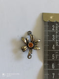 Pendentif fleur vintage Remy Dis Paris, finition argentée, strass orange années