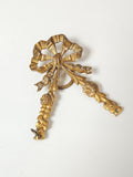 Broche ancienne vintage, bijou rétro, potentiellement plaqué or, collection déco