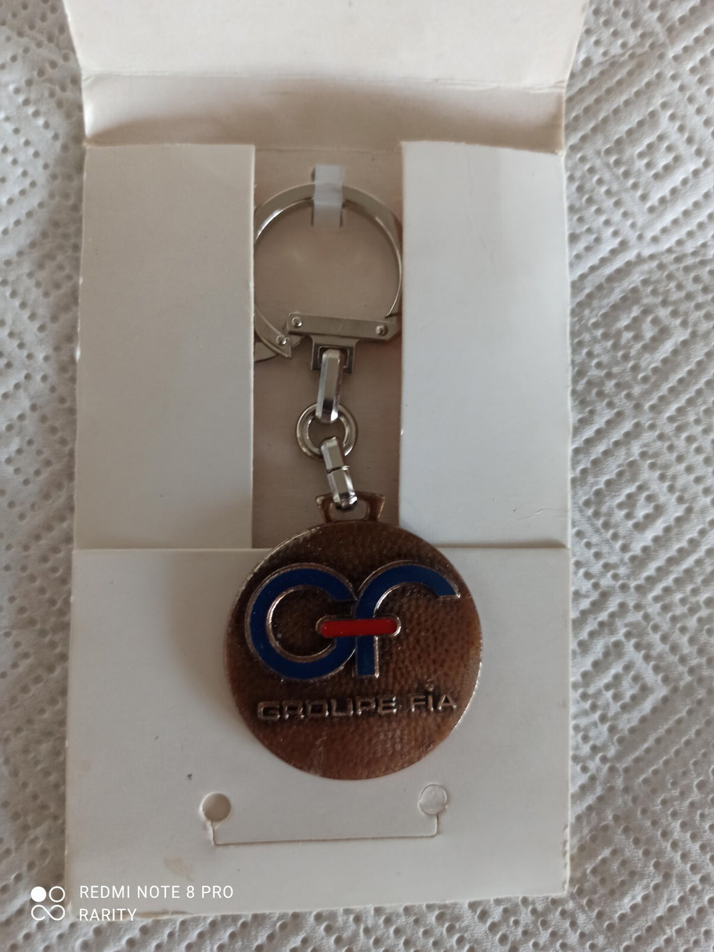 Porte-clés vintage Groupe FIA logo relief, aspect bronze, en boîte ancienne