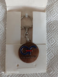 Porte-clés vintage Groupe FIA logo relief, aspect bronze, en boîte ancienne