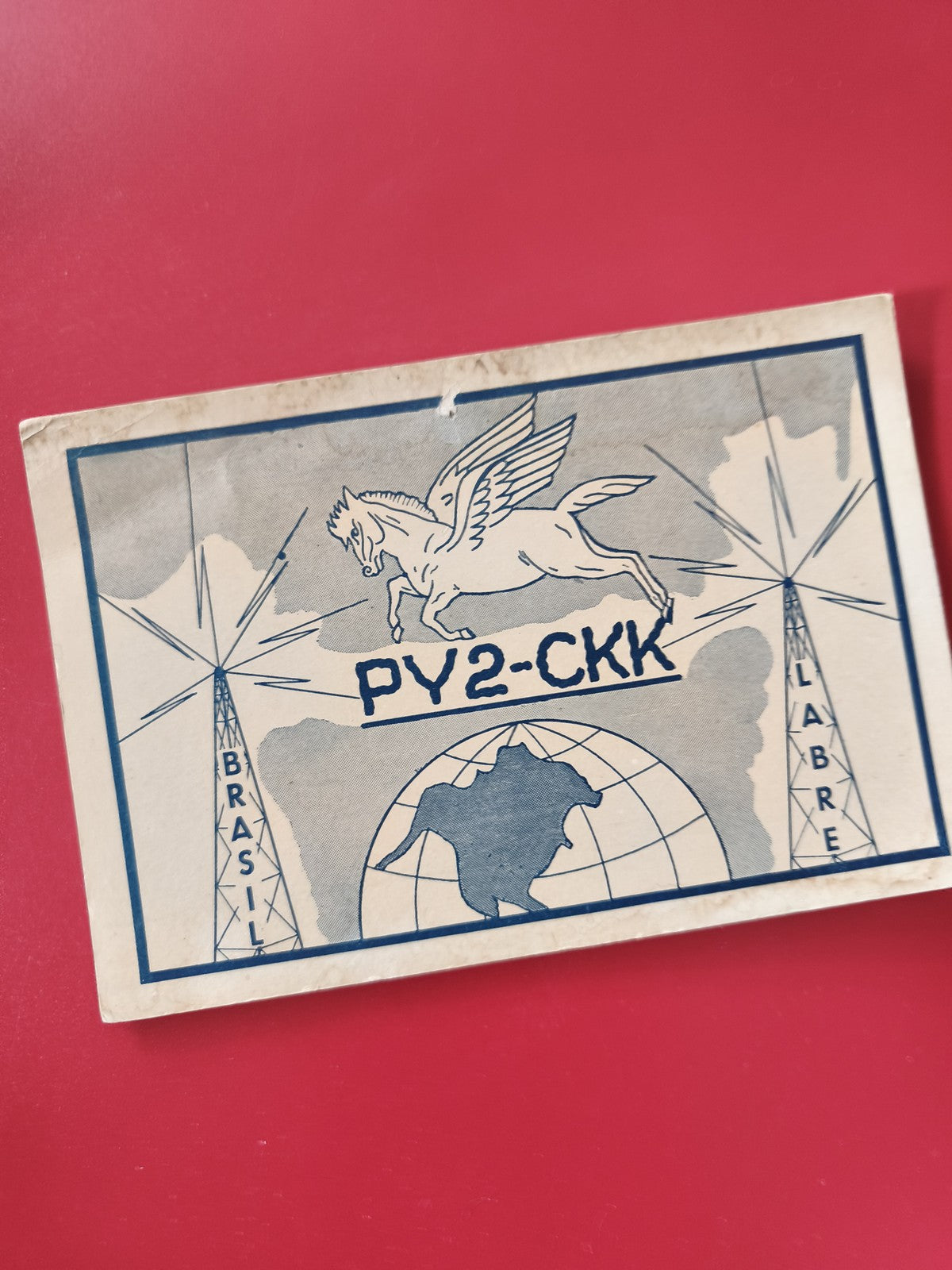 Carte radio PY2-CKK LABRE Brésil motif Pégase bleu sur fond blanc