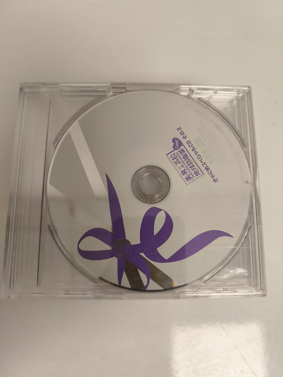 CD musique édition japonaise boîtier cristal, logo violet, J-Pop