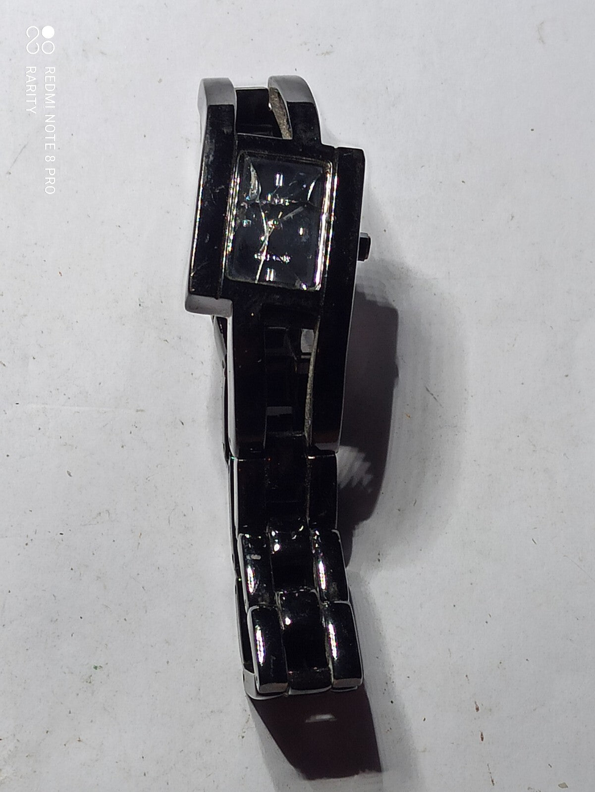 Montre vintage Go noire numérotée, bracelet large, à réparer, pour pièces