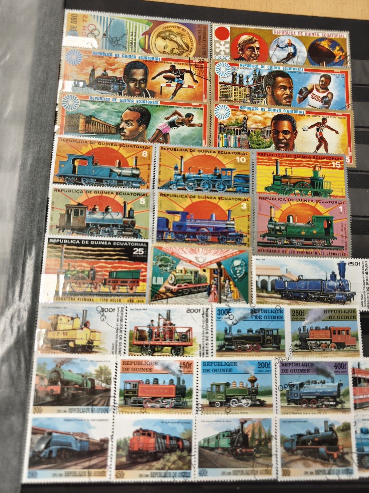 Lot de timbres thématiques sportifs et trains, Guinée et Guinée Équatoriale