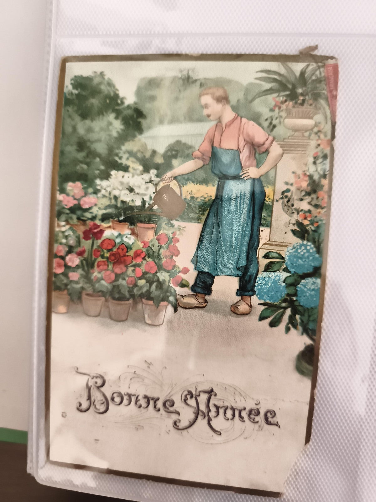 Carte postale ancienne Bonne Année illustrée jardinier fleurs CPA début XXe
