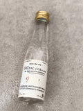 Mini-bouteille alcool Marc Alsace Hepp partiellement remplie eau-de-vie