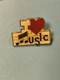 Pin's vintage "J'aime la musique" notes rouges et noires collection musique