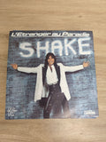 Vinyle 45T Shake L'Étranger au Paradis pochette mur brique Orlando Carrere