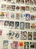 Lot de timbres USA oblitérés portraits, thématiques variées, support non inclus