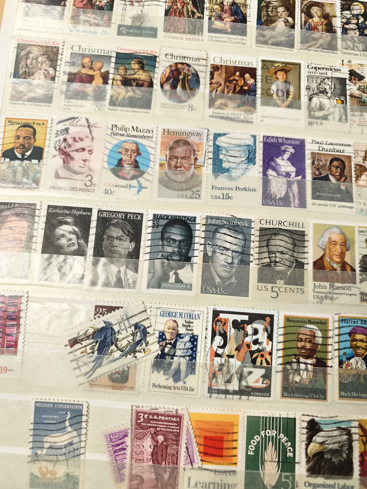 Lot de timbres USA oblitérés portraits, thématiques variées, support non inclus