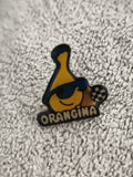 Pin's publicitaire vintage Orangina mascotte lunettes Ref 5 badge rétro