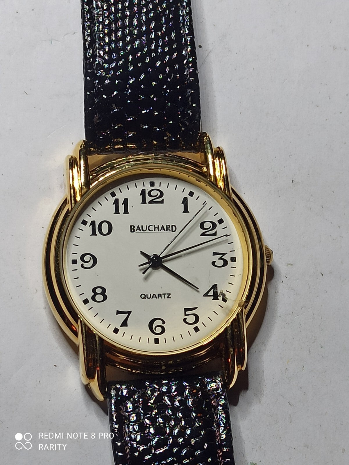 Montre homme Bauchard quartz, cadran blanc doré, bracelet noir, pile à changer