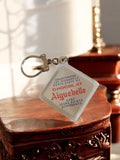 Porte-clés publicitaire vintage Chocolat Aiguebelle, forme losange, rétro pub