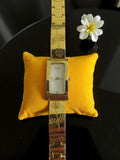 Montre femme Via Lucia vintage dorée, bracelet fleuri, rétro élégant