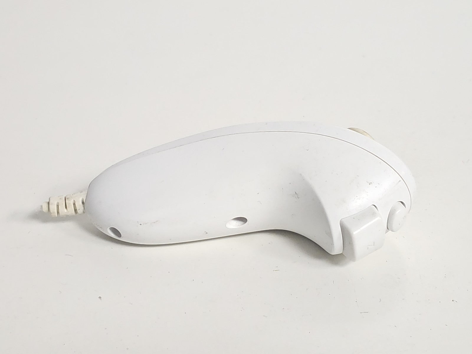 Manette Nunchuck Nintendo Wii défectueuse pour pièces détachées accessoire origi