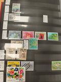 Lot 12 timbres oblitérés Helvetia Suisse thématiques colorées Philatélie
