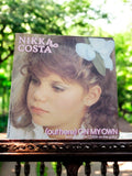 Vinyle 45 tours Nikka Costa vintage (Out Here) On My Own pop années 80