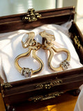 Boucles d’oreilles vintage dorées clips, strass, style rétro glamour