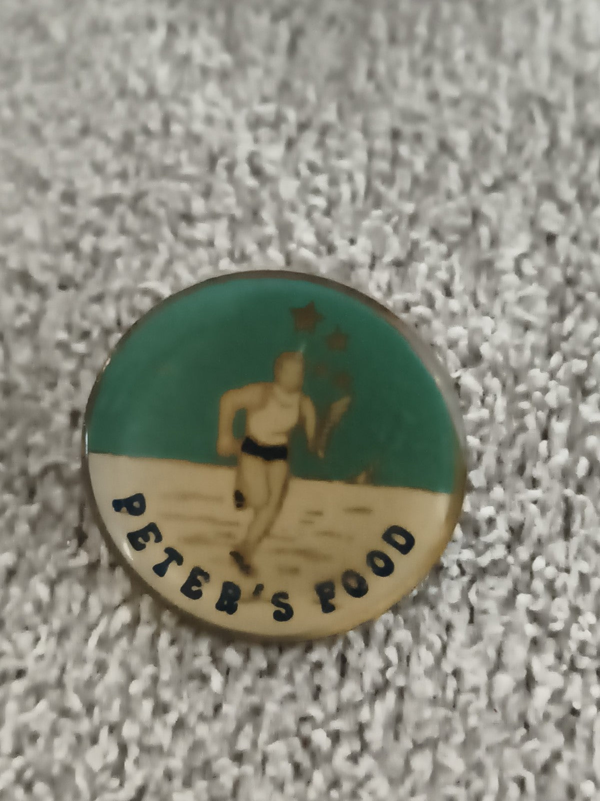 Pin's vintage Peter's Food nageur, badge ancien rond, Publicité rétro (Ref 10)