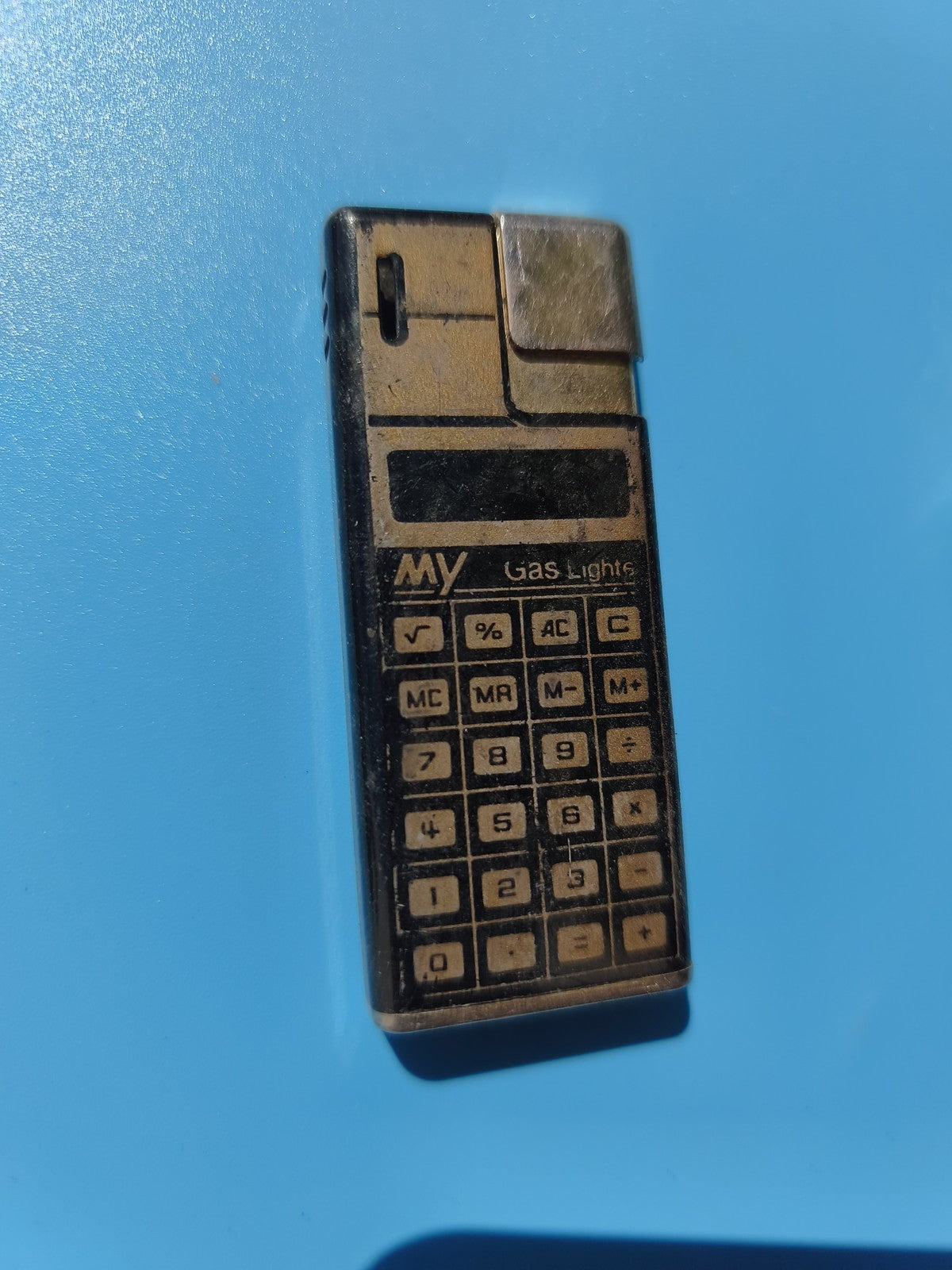 Ancien briquet publicitaire calculatrice vintage, en l?état, collection rétro