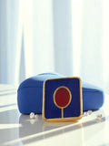 Pin's publicitaire vintage émail rouge blanc bleu, carré, style années 80