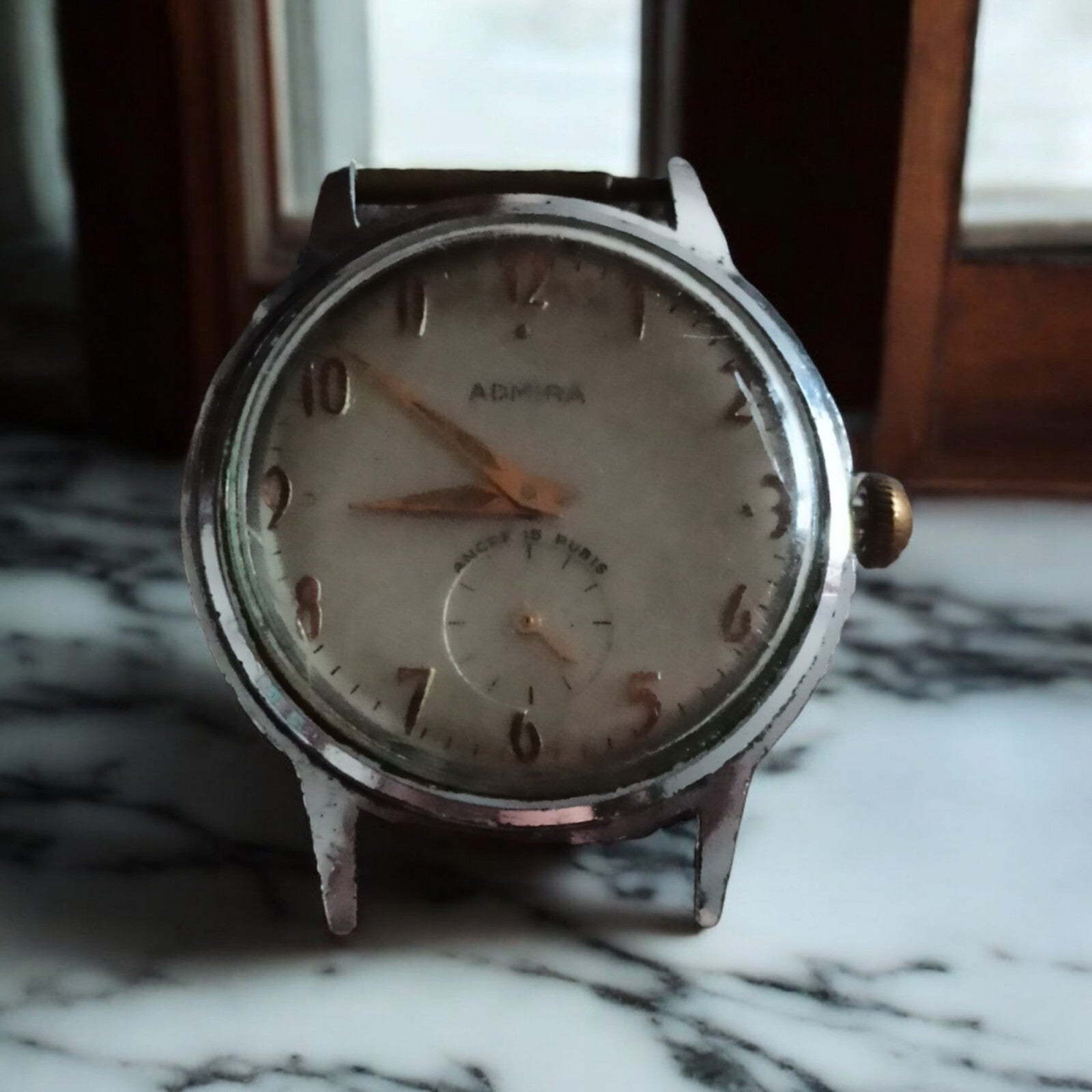 Montre mécanique Admira vintage à restaurer cadran chiffres dorés