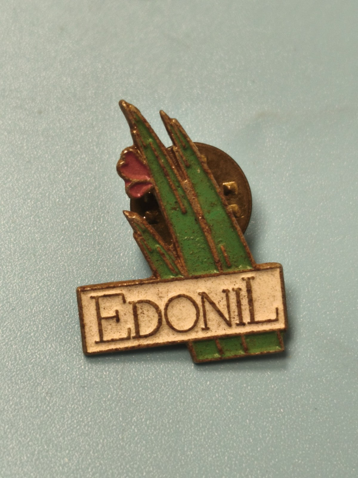 Pin's vintage EDONIL émaillé, motif herbe verte et fleur, collection ancienne
