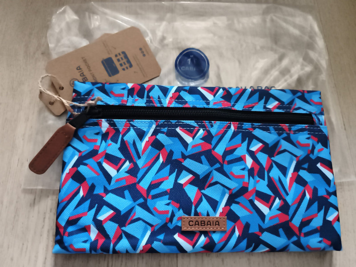 Pochette Cabaia bleu motif abstrait zip avant neuve 24 cm accessoire sac