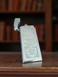 Briquet vintage à essence ancien gravé métal argenté rétro à recharger