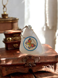 Porte-clés vintage Biscuits Nino France pub papillon triangle rétro années 70